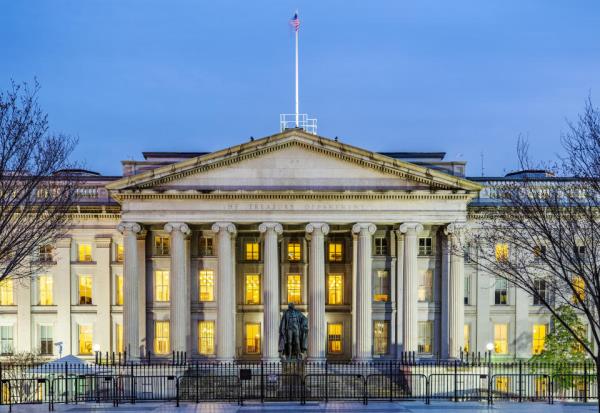 The US Treasury Building in downtown Washington DC, USA at night.